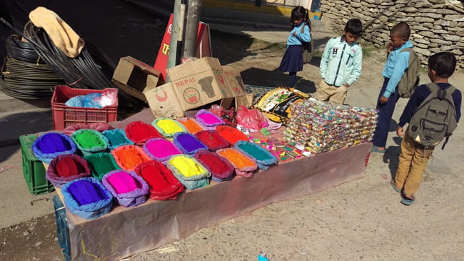 Colours and candies for the upcoming Tihar festival are kept on display at a shop in Besisahar on Wednesday.