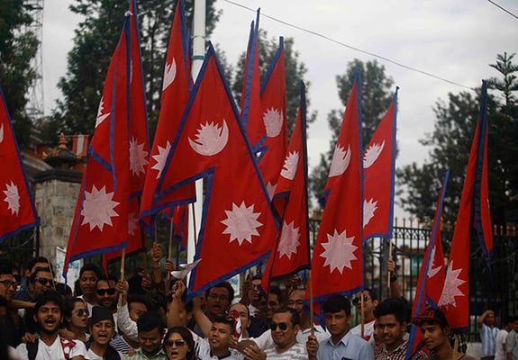 People attend a rally demanding the provision of a directly elected President or Prime Minister in the new constitution at Ratna Park on Saturday.