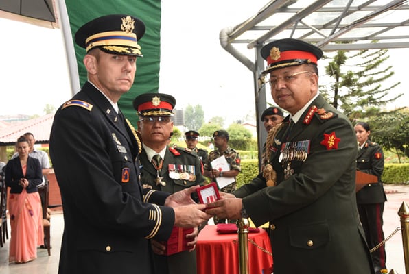 Lt Col Gregory D Pipe receives the Gallantry medal from Chief of Army Staff Rajendra Chettri on behalf of the six US soldiers who lost their lives in a helicopter crash in Sindhupalchok during a rescue mission after the 2015 earthquake.