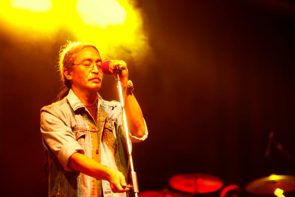 Nepali folk-rock band Nepathya's frontman, Amrit Gurung, performs at a concert organised in support of earthquake victims at Jawalakhel Football Ground on Saturday.