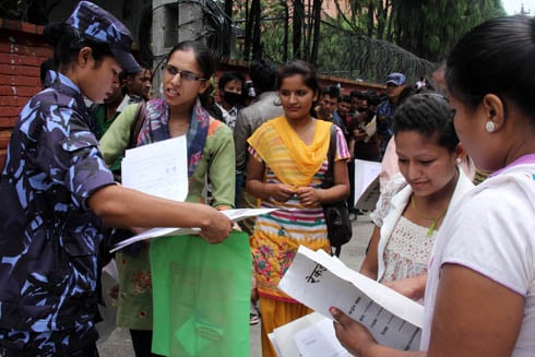 OUR TURN: Young women queue at Mahendra Police Club on Wednesday to apply for the post of assistant sub-inspector in Nepal Police.