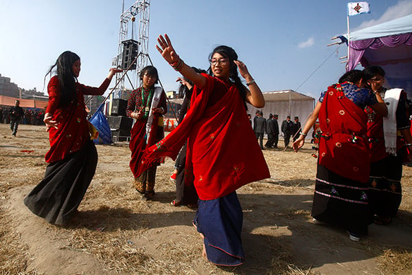 Magar girls dressed in traditional wear celebrate the Maghi Sankranti Festival in Tudhikhel on Friday.