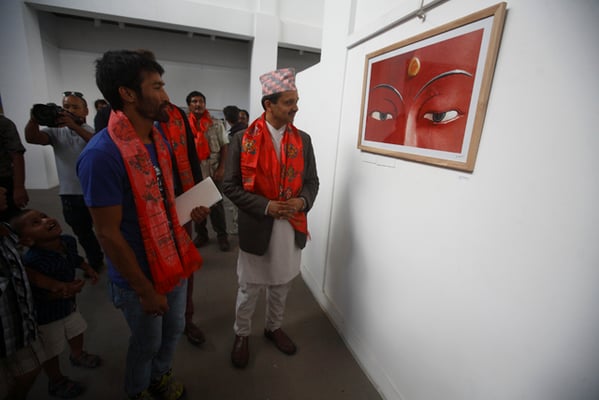 Vice Chairperson of the National Planning Commission Govinda Raj Pokharel (right) with Laxmi Prasad Ngakhusi at the photographer's exhibition 'Rising from the rubble' on Tuesday.