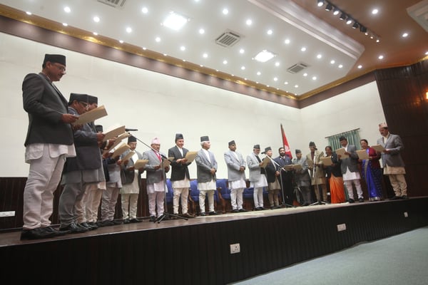 I PROMISE: Prime Minister Sushil Koirala administers the oath of office and secrecy to the newly appointed ministers at Sheetal Niwas, Kathmandu on Tuesday.