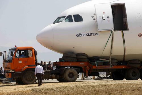 A Turkish Airlines plane being removed from the runway of Tribhuvan International Airport (TIA) on Saturday. After the plane's crash-landing, the TIA remained closed for four days.