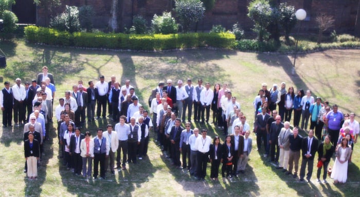 GRAND: UN staff in Kathmandu pose for a photo to commemorate the 1,000 Days to Go for the Millennium Development Goals on Friday.