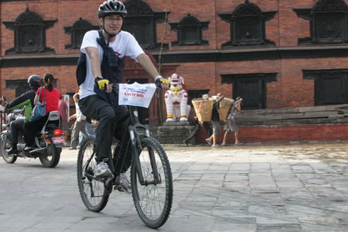 PEDAL POWER: A cyclist on his way to participate in the World Tourism Day rally at Basantapur on Friday.