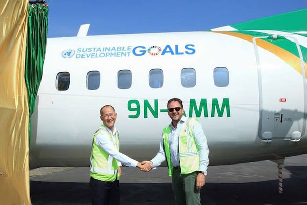 UNDP Country Director Renaud Meyer and Yeti Airlines CEO Umesh Chandra Rai at a rollout of the airlines' new ATR72-500 branded with the UN's Sustainable Development Goals logo in Kathmandu last week.