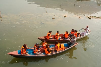 NEW RULE: Tourists wear compulsory life jackets while taking a boat ride on Phewa Lake in Pokhara on Sunday.