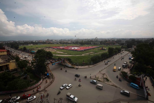 Participants attempt to break the Guinness World Record for the largest human national flag at Tundikhel on Saturday.
