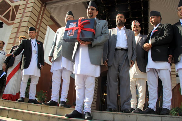 Finance Minister Ram Sharan Mahat arrives at the parliament to present the budget on Sunday.