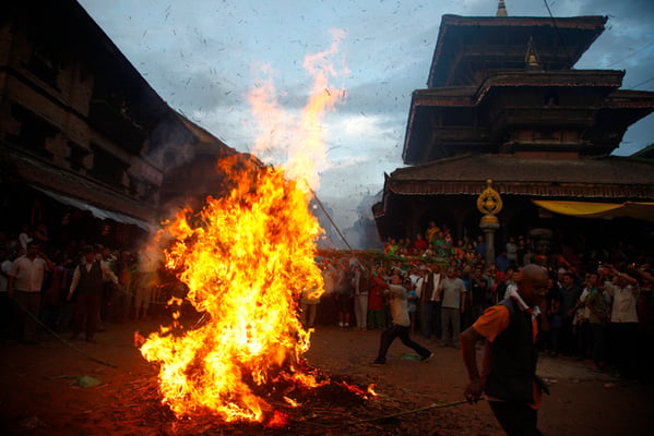 Locals of Bhaktapur burn an effigy of demon Ghantakarna symbolising the destruction of evil on the occasion of Gathamuga festival on Monday.