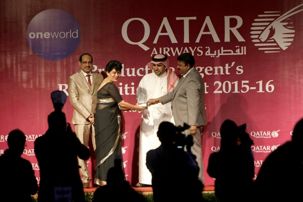 A travel agent gets an award during Qatar Airways' Productive Agents Recognition event at Soaltee Crowne Plaza, Kathmandu on Tuesday.