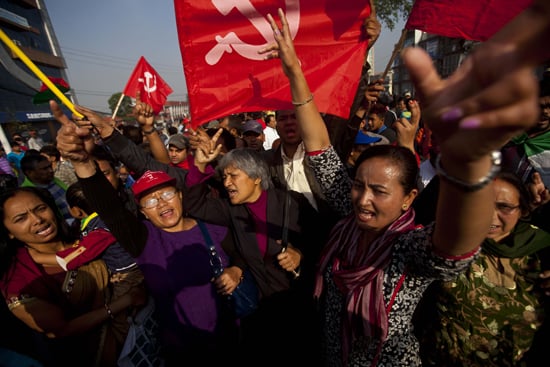 Maoist leader Hisila Yami (middle) and party cadres shout slogans during the first day of the three-day Nepal Bandh called by the UCPN(M)-led 30-party alliance on Tuesday.