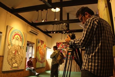 ON CAMERA: A documentary maker captures video of the art exhibition A Federal Life in Yala Maya Kendra, Patan, on Wednesday.
