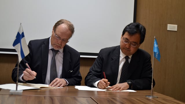 Finnish Ambassador Jorma Suvanto and UNICEF Representative to Nepal Tomoo Hozumi sign the agreement to co-finance recovery and reconstruction of WASH facilities in earthquake affected schools and communities in Kathmandu on Wednesday.