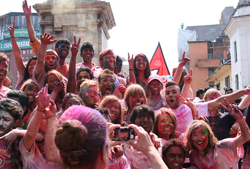 HAPPY HOLI: Locals and foreigners celebrating Holi, the festival of colors, in Kathmandu on Sunday.