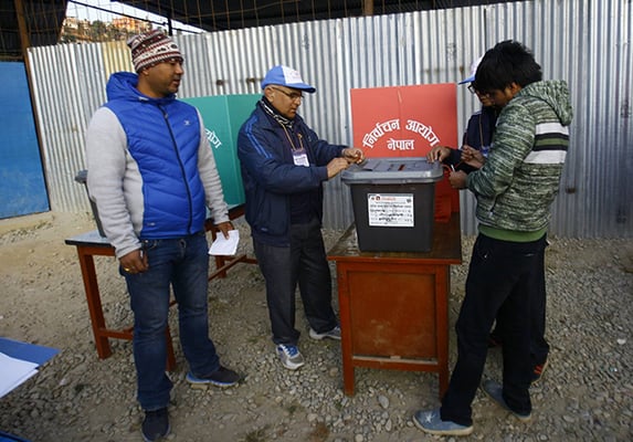 Final preparation at a polling station in Chautara in Sindupalchok on Sunday morning before the first phase of parliamentary and provincial elections in 32 mountain and hill districts.