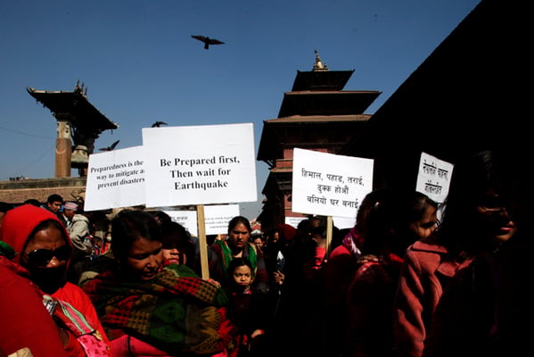 People participate in a disability-inclusive earthquake safety walkathon near Patan Darbar Sqaure on Monday.