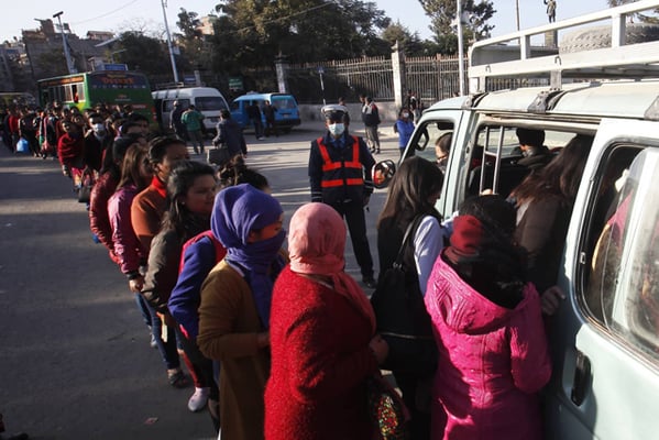 Commuters queue up to get on a bus at Ratnapark on Friday. The Metropolitan Traffic Police Division has launched a week-long campaign to ensure hassle-free travel for all the passengers commuting by public transportation.