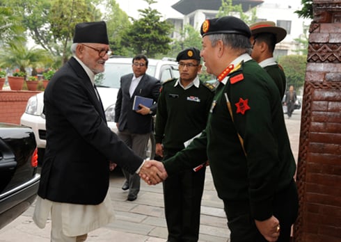 LONG TIME: Army Chief Gaurav Shumsher Rana welcomes Prime Minister Sushil Koirala at Nepal Army headquarters at Bhadrakali on Monday.