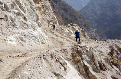 ROUTE LESS TRAVELLED: Mountain bikers ride through the newly opened track of the proposed Bagmati fast highway in Makwanpur.