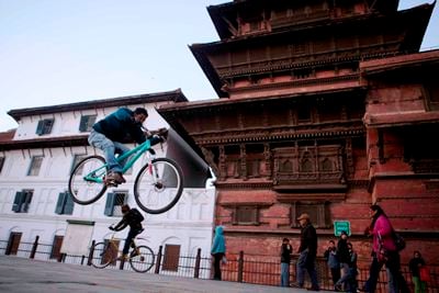 BYCICLE RACE: A teenager shows off his bike skills at Basantapur Darbar Square on Monday.