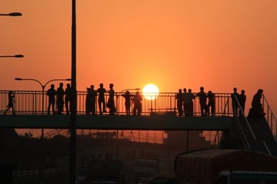 SUNSET POINT: People use this sky bridge to cross the busy road and to get a better view of sunset in Jadibuti, Koteshwor, on Wednesday.