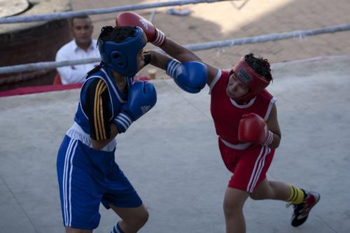 Female boxers participate during the Bir Ganesh Man Singh National Open Women's & Men's Boxing Tournament at Basantapur Durbar Square on Sunday.
