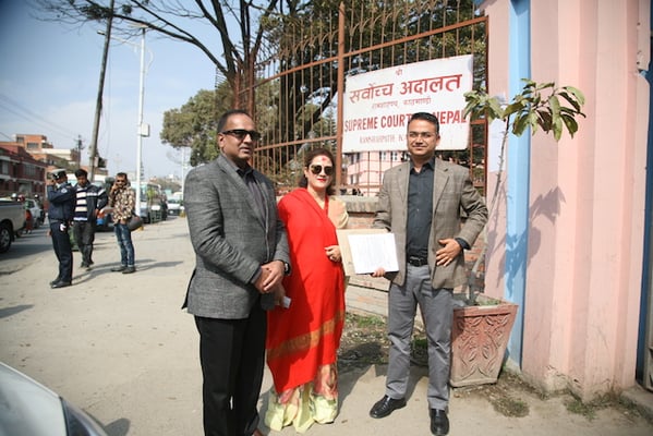 Publisher and Chairman of Kantipur Publication Kailash Sirohiya, Director Swastika Sirohiya and Editor of Kantipur Daily Sudheer Sharma (left to right), appear briefly in court on Friday. They were summoned by the Chief Justice for publishing articles critical of him, in a case widely condemned as an attack on press freedom.