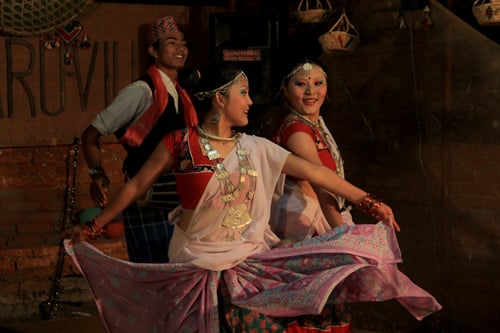 Students from the Tharu society perform a traditional dance at the Tharu Village in Anamnagar on Sunday.