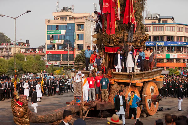 Guthi Sansthan official displays the bejeweled vest known as bhoto to the public from the chariot of Rato Machhindranath during the Bhoto Jatra festival in Jawalakhel on Monday.