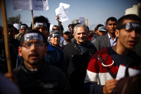 Naya Shakti Party's President Baburam Bhattarai and his wife, Hisila Yami, participate in a rally, organised by the Solidarity for Govinda KC alliance, in New Baneshwor on Saturday.