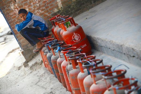 A boy waits in line for cooking gas at Kalopul on Thursday. The ongoing blockade has caused severe fuel and gas shortage around the country.