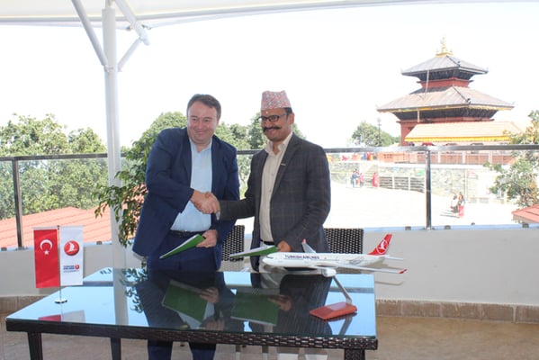 General Manager of Turkish Airlines Abdullah Tuncer Kececi and Abhishek Bikram Shah of Chandragiri Cablecar sign a cooperation agreement on Thursday.