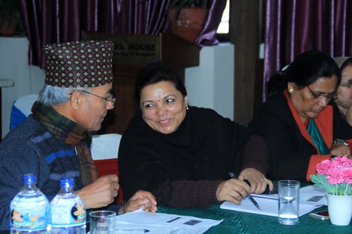 Former election commissioner Bhoj Raj Pokharel with Dalit women rights activist Durga Sob at a program discussion on gender friendly electoral system on Monday.