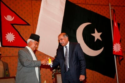 CONGRATULATIONS: Vice-president Parmanand Jha congratulates Pakistani ambassador to Nepal Arshed Saud Khosa on the anniversary of his country, at the Hyatt hotel on Saturday.