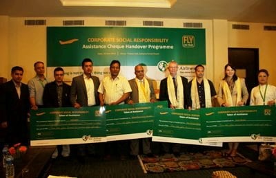 GIVE BACK: Yeti Airlines officials hand over cheques to The United Mission, Red Cross, Care, Save the Children,and KIRDARC in Gorkana on Wednesday.
