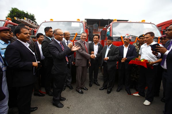 Indian ambassador to Nepal Ranjit Rae and Minister of Federal Affairs and Local Development Hitraj Pandey at the handing-over ceremony of 17 fire brigades gifted by India to Nepal at City Hall, Kathmandu on Wednesday.
