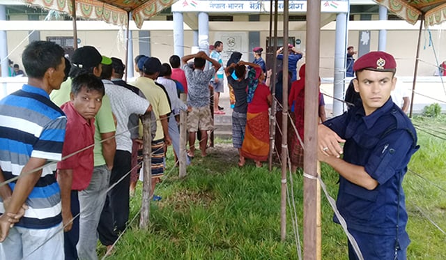 Locals in Ward 19 of Bharatpur Metropolitan City line up to cast their votes for the second time on Friday after the Supreme Court ordered re-polling.
