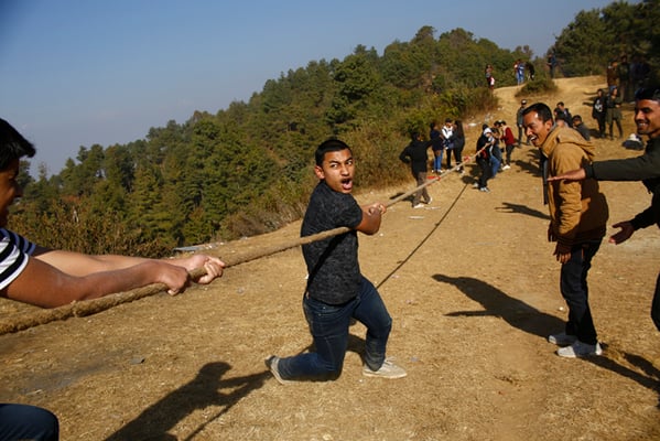 Picnic-goers play the tug of war at Lakuri Bhanjhyang on Saturday,