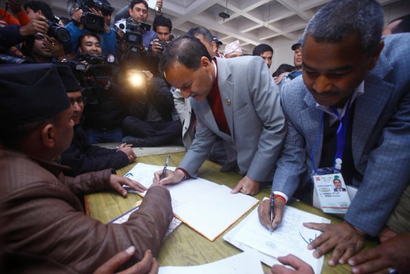 General Secretary of Nepali Congress Krishna Prasad Sitaula registers his candidacy for the post of Party President at the party office in Sanepa on Friday.