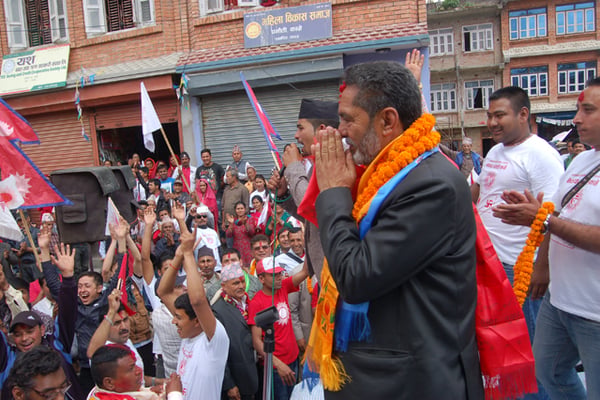 The UML candidate for the mayor of Panauti Municipality, Bhim Neupane who used to be village council chair of Kushadevi campaigning on Monday.