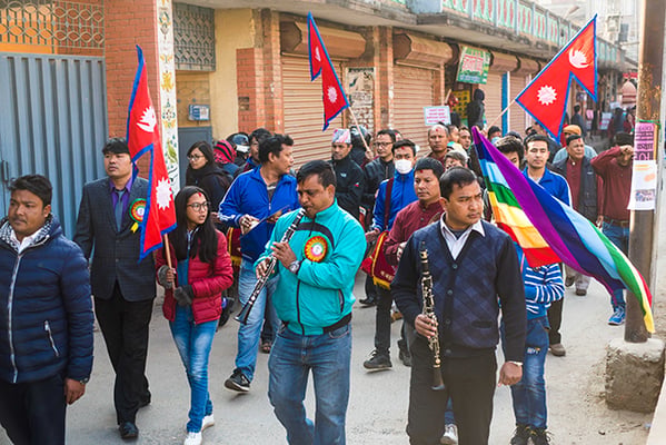 People celebrate National Co-operative Day by parading in Patan on Wednesday. Over three million people are affiliated with some 19,000 informal cooperatives in saving and credit associations around the country.