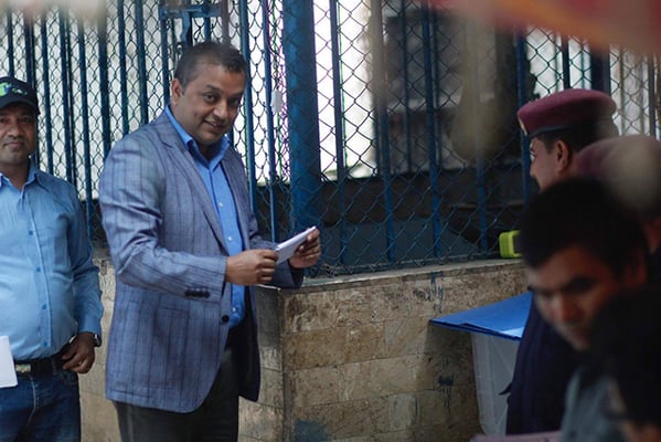 Health Minister Gagan Thapa casts his vote from Maitidevi during the first phase of local elections on Sunday.