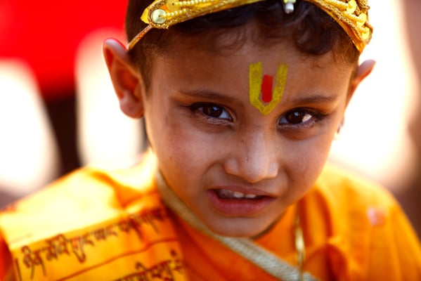 A little boy dresses up as Hindu deity Krishna on the occasion of Krishna Janmasthami in Patan on Thursday.
