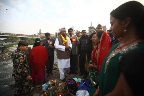 BEST WISHES: President Ram Baran Yadav attends Chhat festivities near the banks of the Bagmati river in Thapathali on Friday.