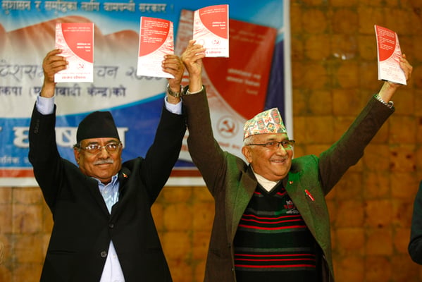 Pushpa Kamal Dahal, Chairman of CPN-Maoist (Centre) and KP Oli, Chairman of CPN-UML during the launch of their joint election manifesto in Tinkune on Tuesday.