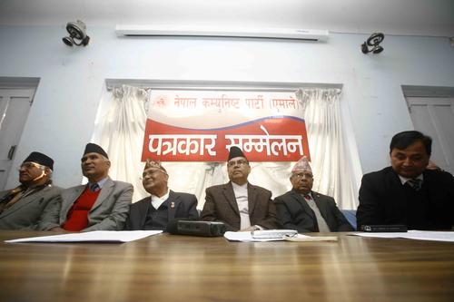 UML Chairman KP Sharma Oli (third, left), Jhala Nath Khanal (center), Madhav Kumar Nepal (second, right) with other UML leaders during a press conference at Balkhu on Wednesday.