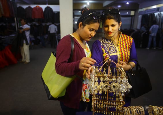 Women select jewelry at the Made in Pakistan exhibition at United World Trade Center, Tripureshwor on Tuesday.